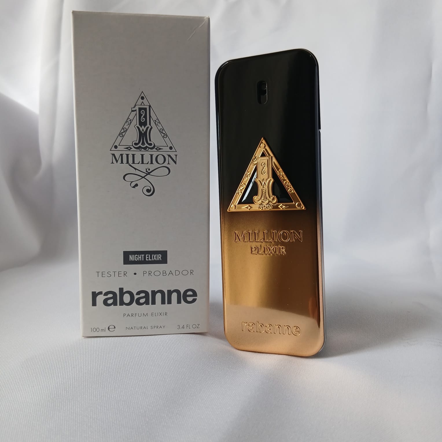 Perfume Rabanne One Million Night Elixir junto a su caja tester